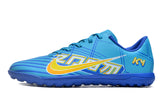 Chuteira Infantil Society Nike Mercurial Vapor 15 Club TF Azul "Mbappe Comic"