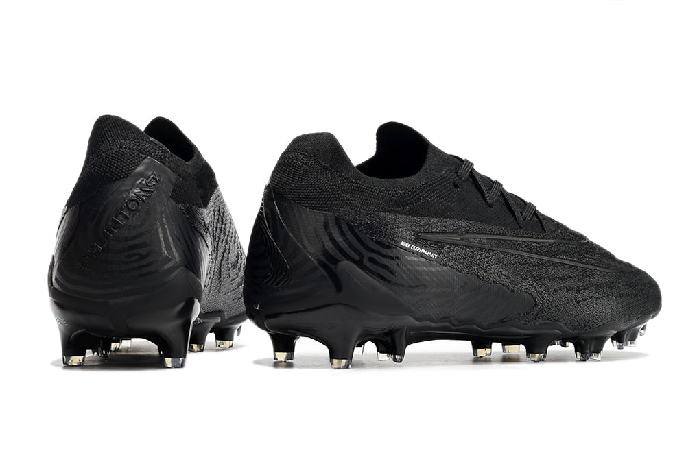 Chuteira Nike Phantom GX Low Elite FG Campo