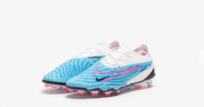 Chuteira Nike Phantom GX Low Elite FG Campo Azul com Rosa